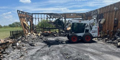 Demolition of structure by big equipment